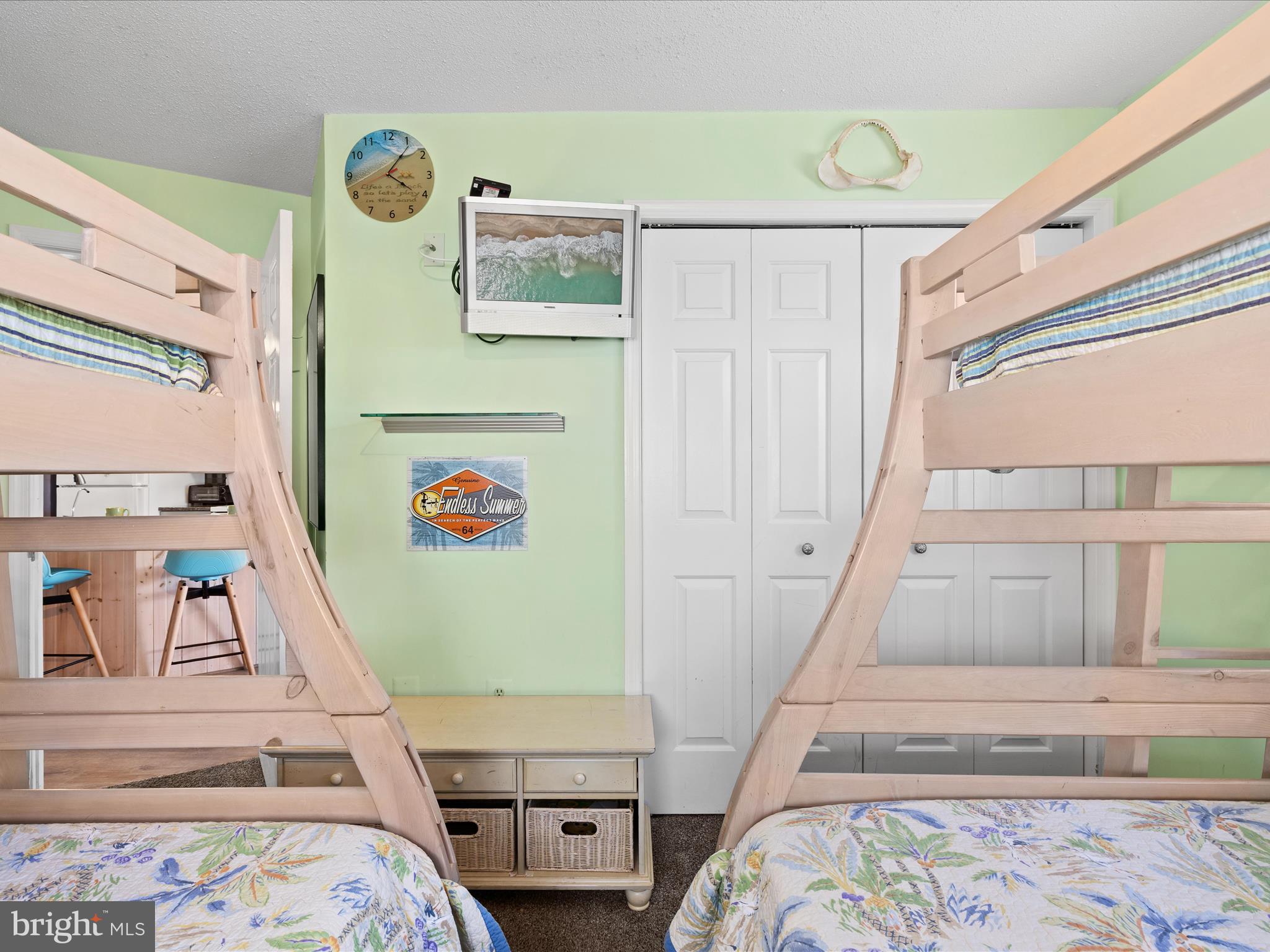 5500 Coastal Highway, Unit B23003 Ocean City, MD 21842 - Photo 18 of 26 a view of bedroom with furniture and front door