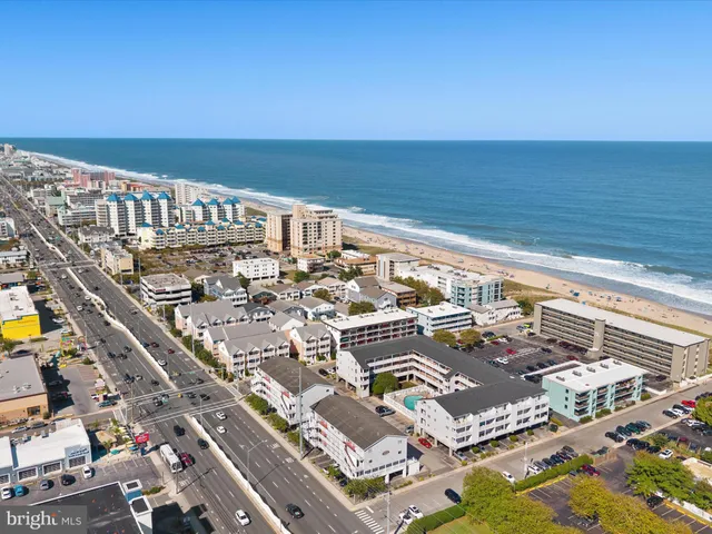a view of city with ocean