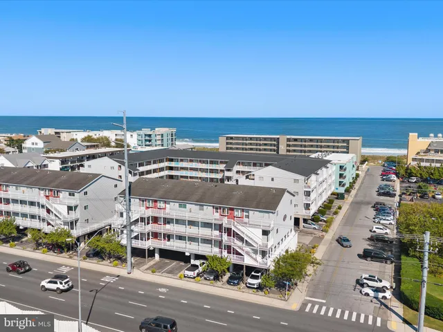 an aerial view of a building with outdoor area