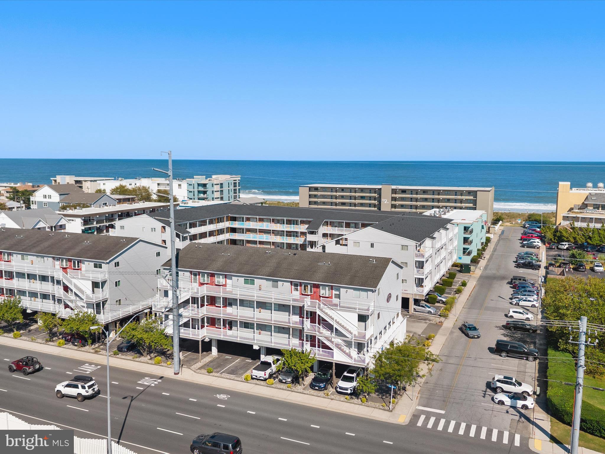 5500 Coastal Highway, Unit B23003 Ocean City, MD 21842 - Photo 24 of 26 an aerial view of a building with outdoor area