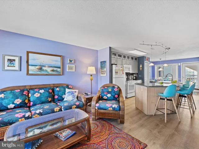 a bed room with furniture and a baby crib