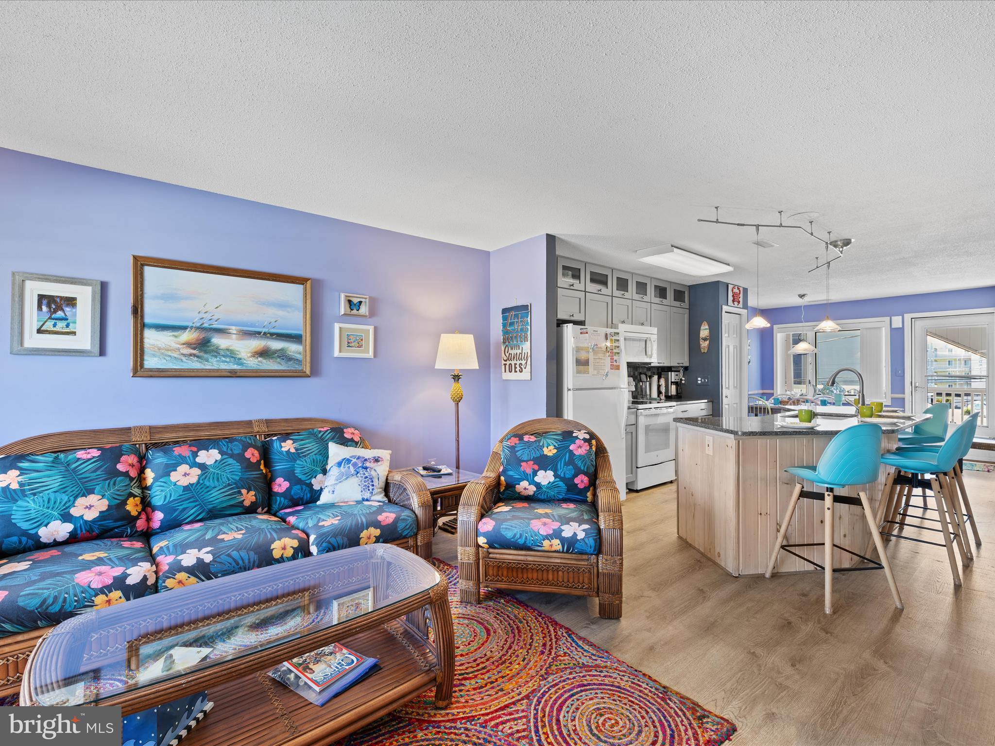 5500 Coastal Highway, Unit B23003 Ocean City, MD 21842 - Photo 9 of 26 a bed room with furniture and a baby crib