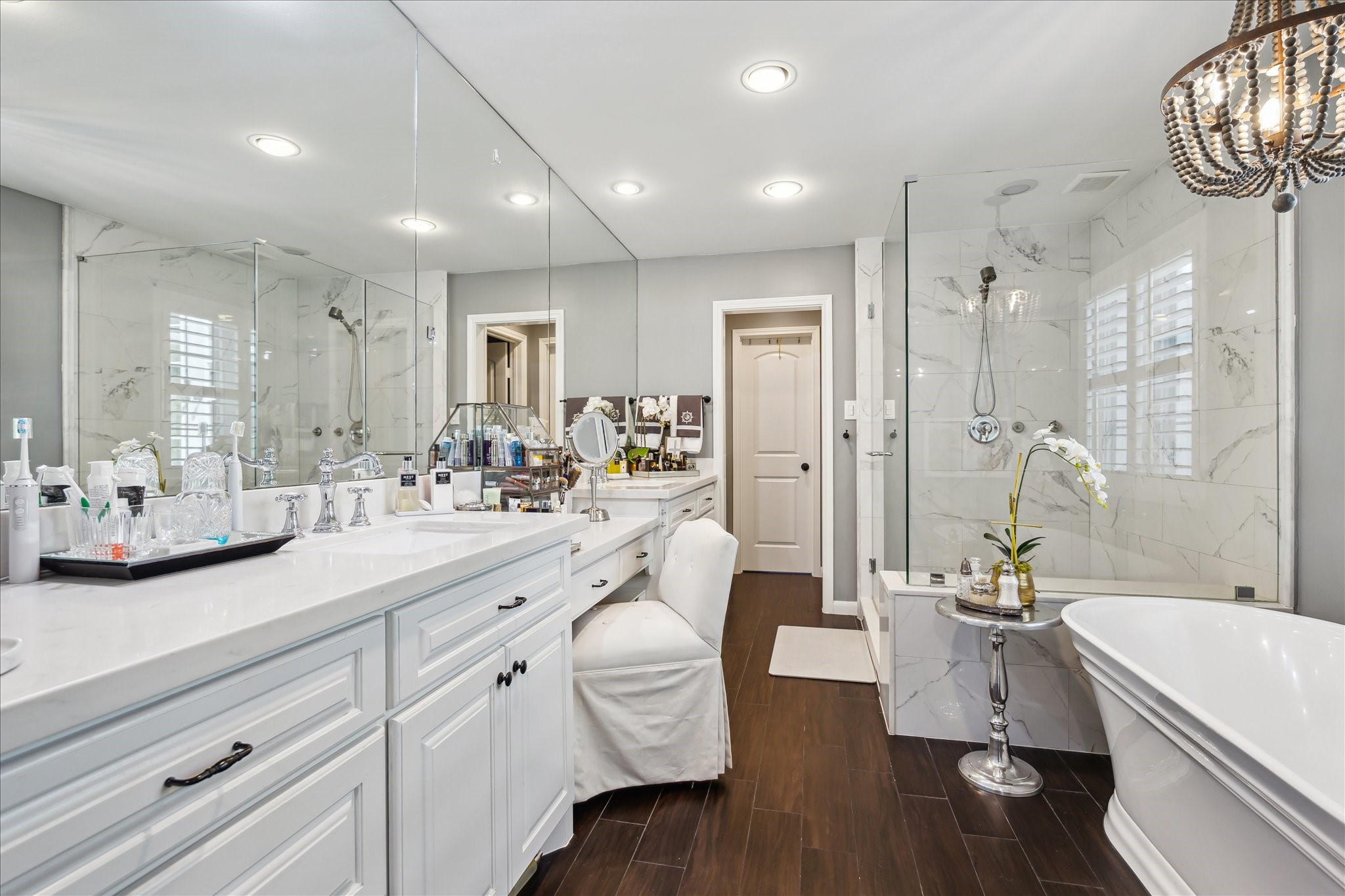 2220 Fulham Court Houston, TX 77063 - Photo 13 of 21 Primary bath fit for royalty, featuring a spacious walk-in shower and a large standalone soaking tub—designed for ultimate comfort and relaxation.