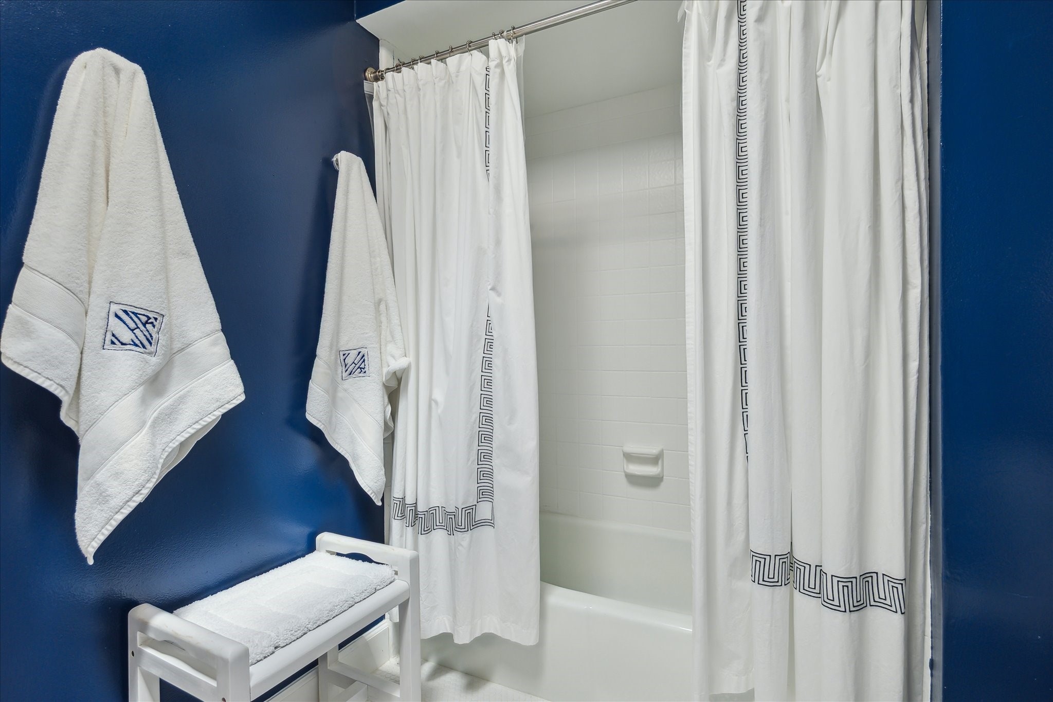 2220 Fulham Court Houston, TX 77063 - Photo 21 of 21 A stylish view of the secondary bath showcasing the water closet and soaking tub—designed with comfort and privacy in mind.