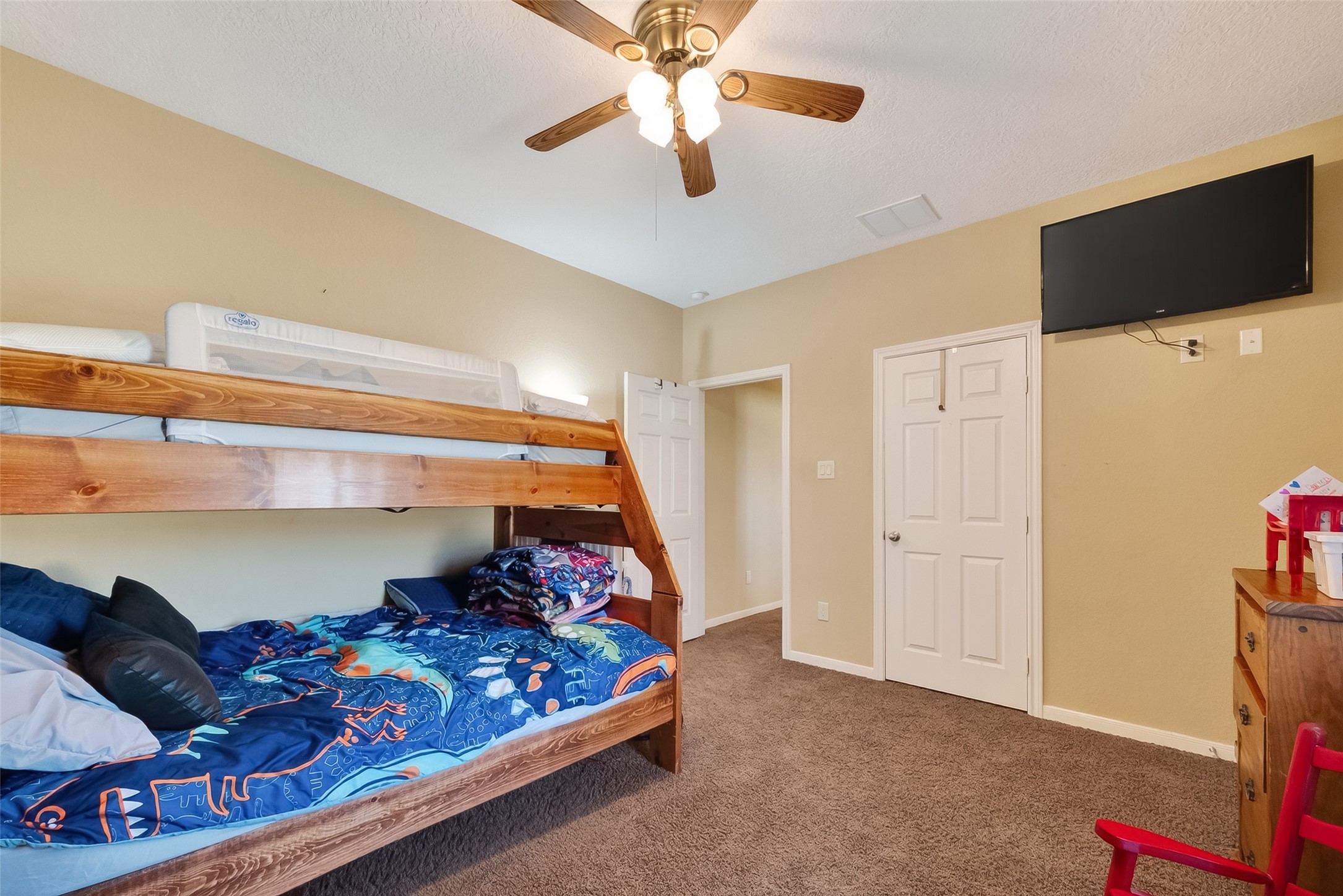 3418 Barbers Hill Road Highlands, TX 77562 - Photo 40 of 50 a bedroom with a bed and a tv