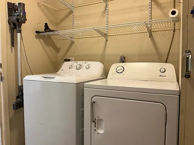 a utility room with dryer and washer