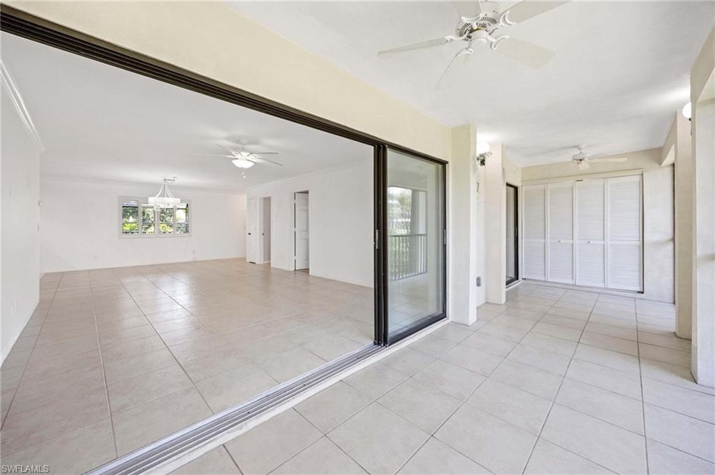 1608 Spoonbill Lane, Unit B Naples, FL 34105 - Photo 16 of 31 a view of an empty room