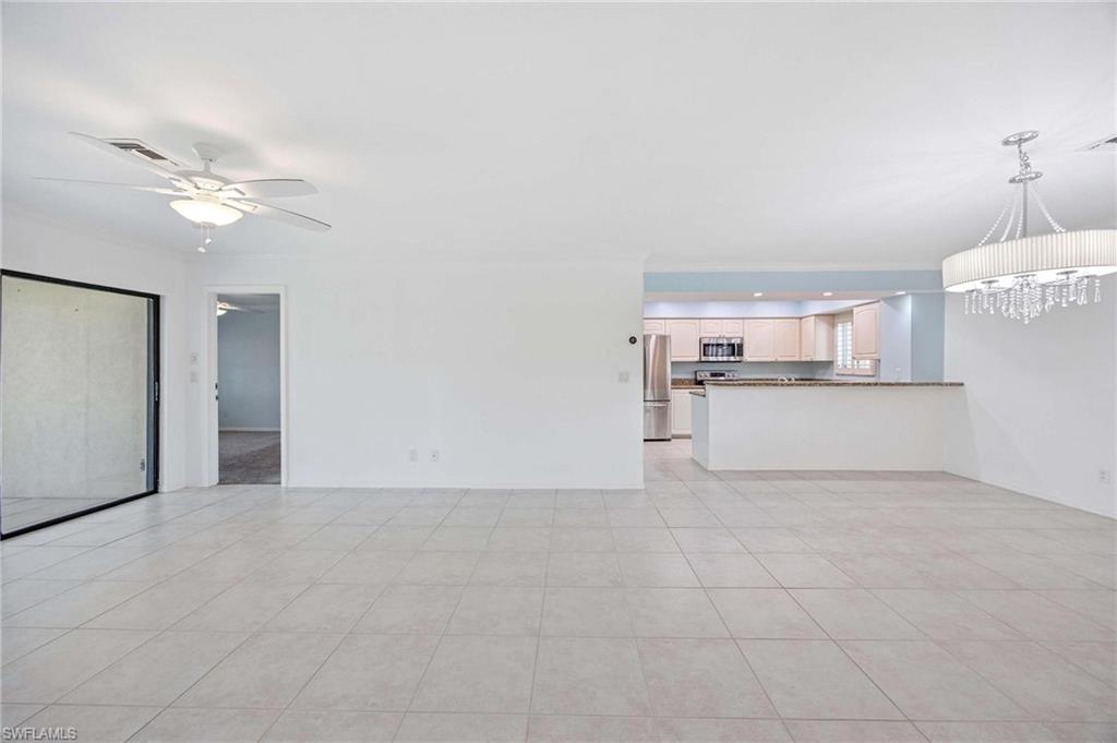 1608 Spoonbill Lane, Unit B Naples, FL 34105 - Photo 8 of 31 a view of a kitchen with electric appliances