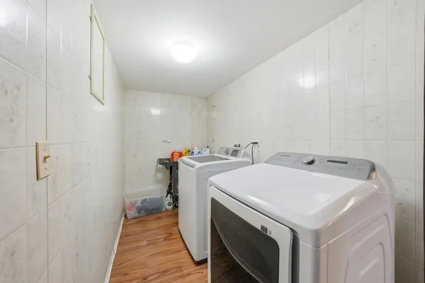a utility room with dryer and washer