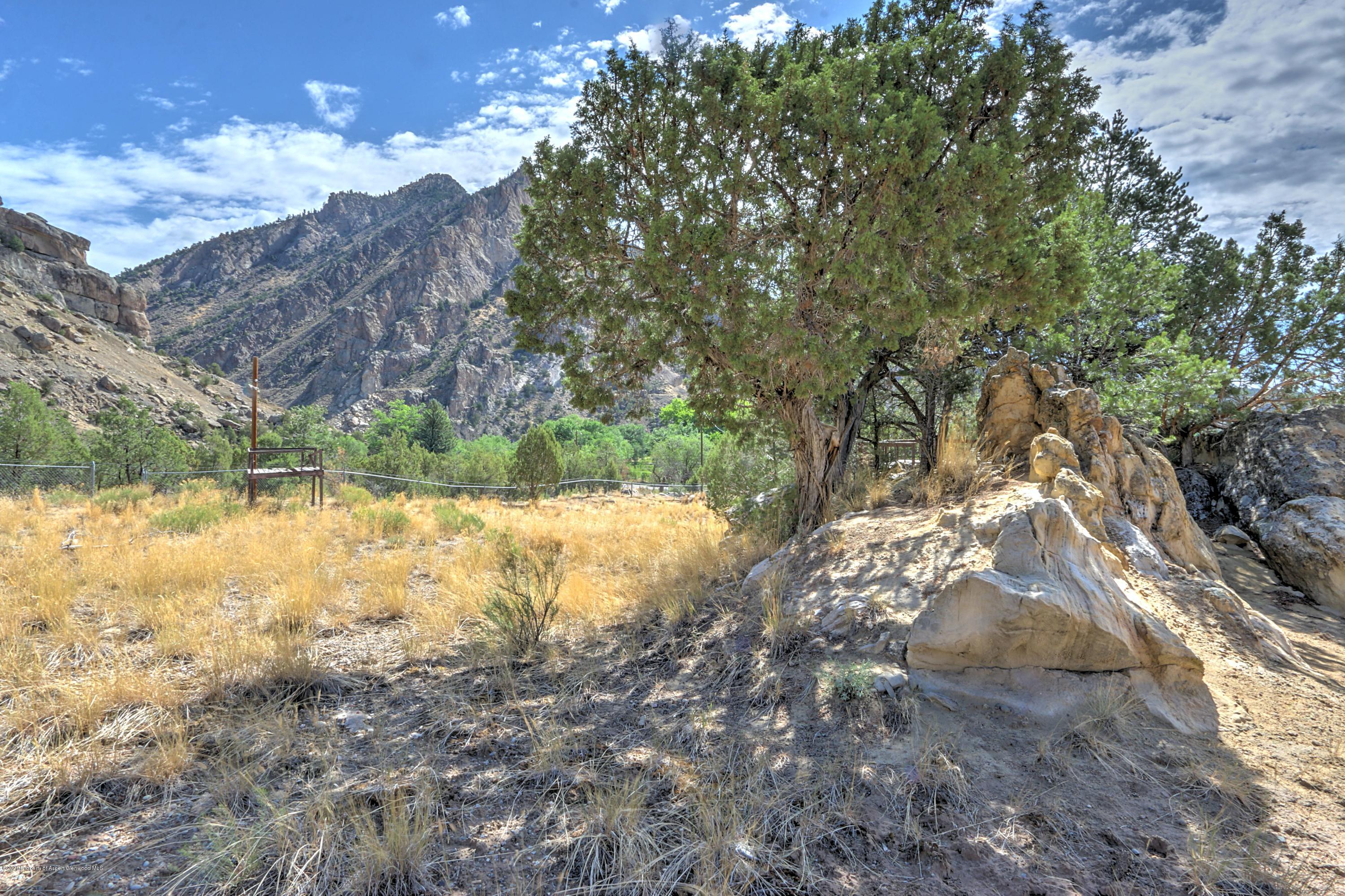 3045 Highway 325 Rifle, CO 81650 - Photo 28 of 35 a view of a yard with mountain view