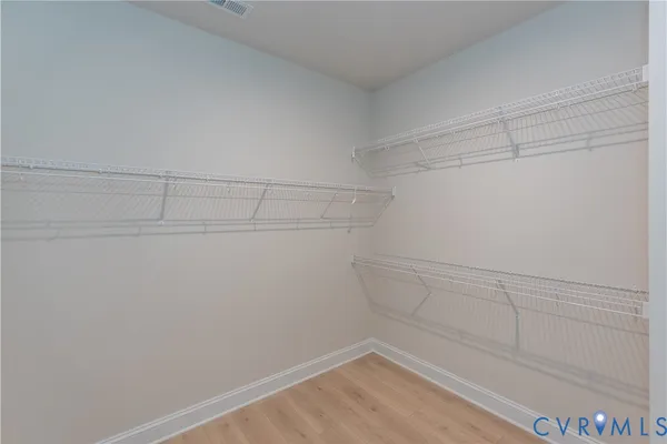 a view of a room with racks on the wall