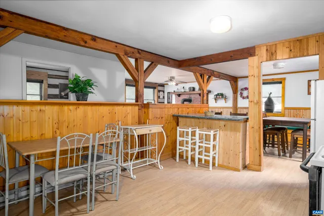 a view of a chairs and table in a patio