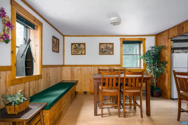 a view of a chairs and table in a patio
