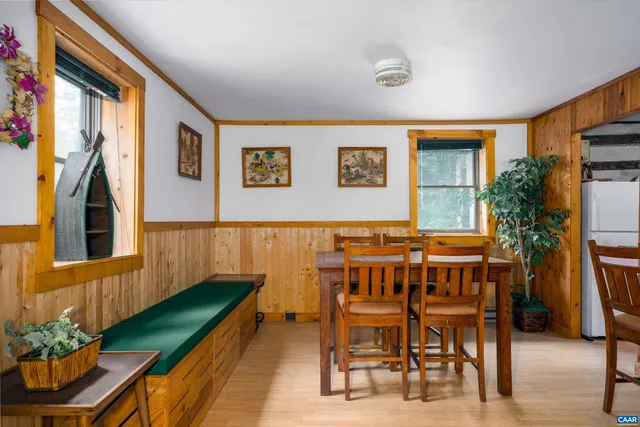a view of a chairs and table in a patio