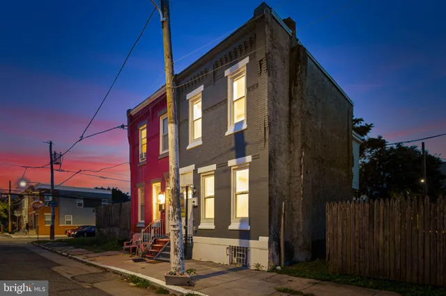 a front view of a building with street view