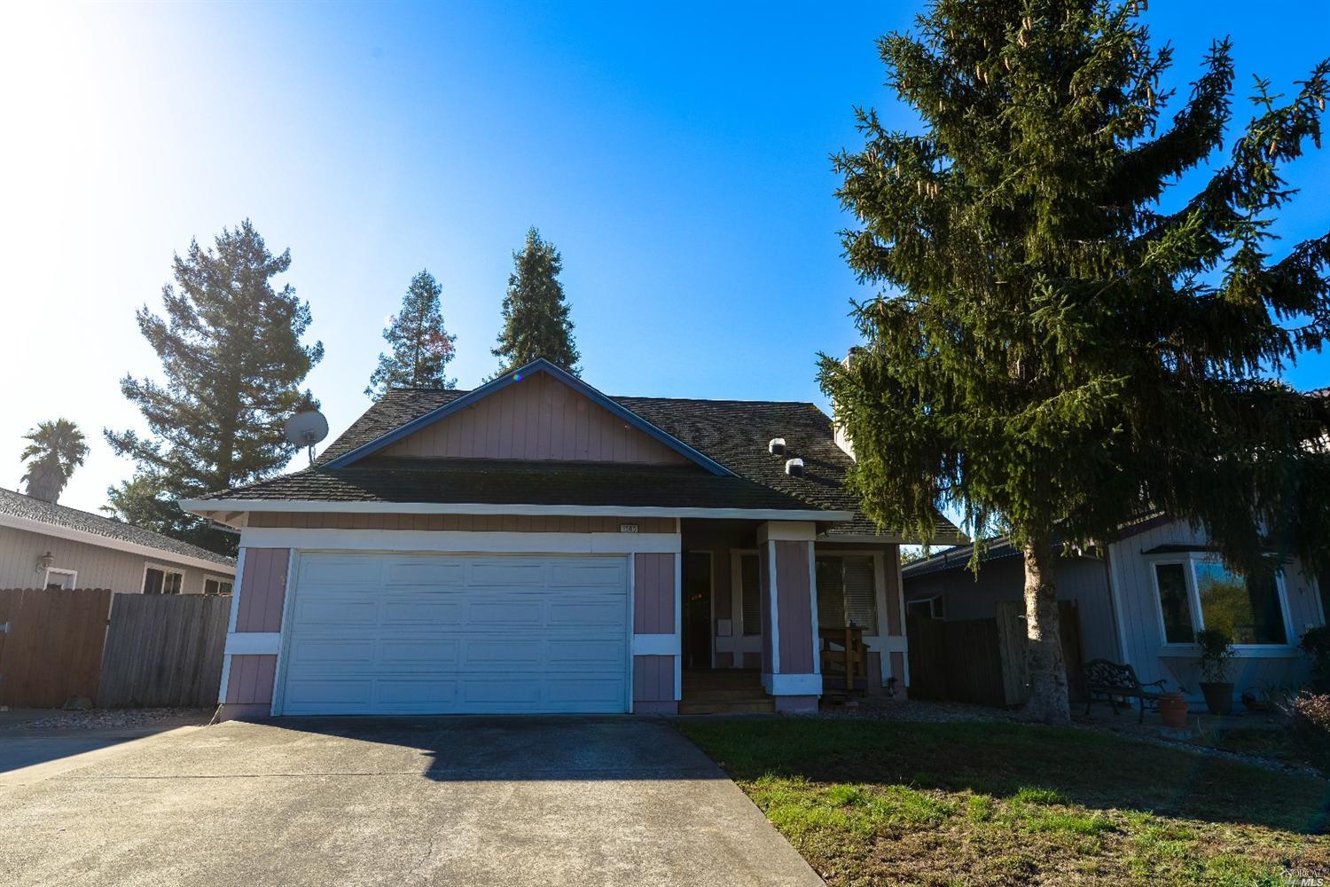 1565 Golf Course Drive Rohnert Park, CA 94928 - Photo 1 of 1 a front view of a house with a yard