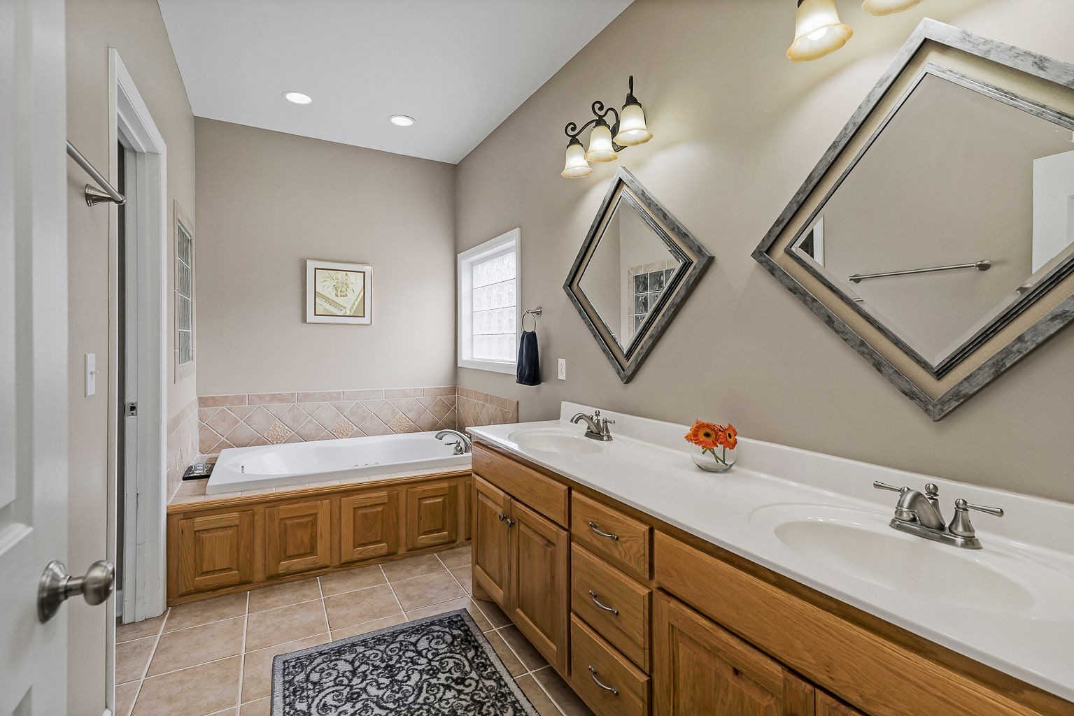 164 Simons Boulevard Morrison, TN 37357 - Photo 16 of 16 a bathroom with a tub sink and mirror