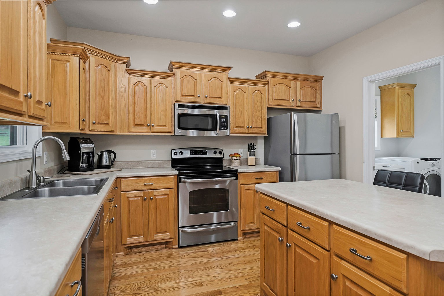 164 Simons Boulevard Morrison, TN 37357 - Photo 4 of 16 a kitchen with stainless steel appliances granite countertop a refrigerator stove a sink and dishwasher