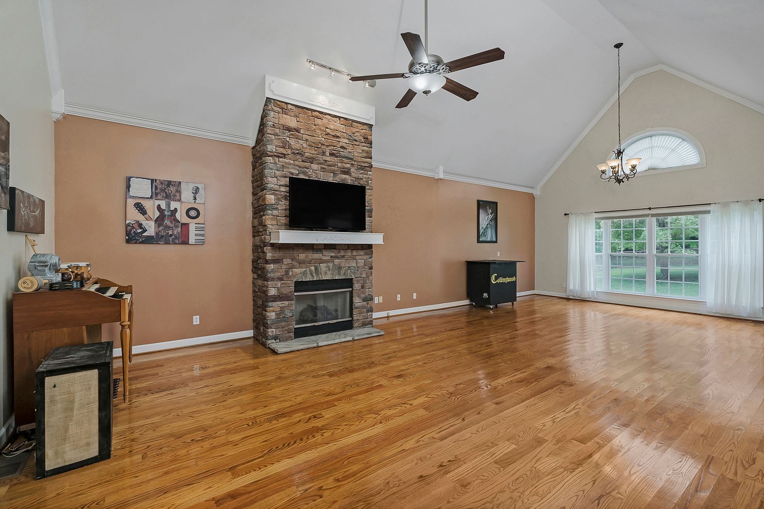 164 Simons Boulevard Morrison, TN 37357 - Photo 5 of 16 a view of an empty room with a fireplace and a window