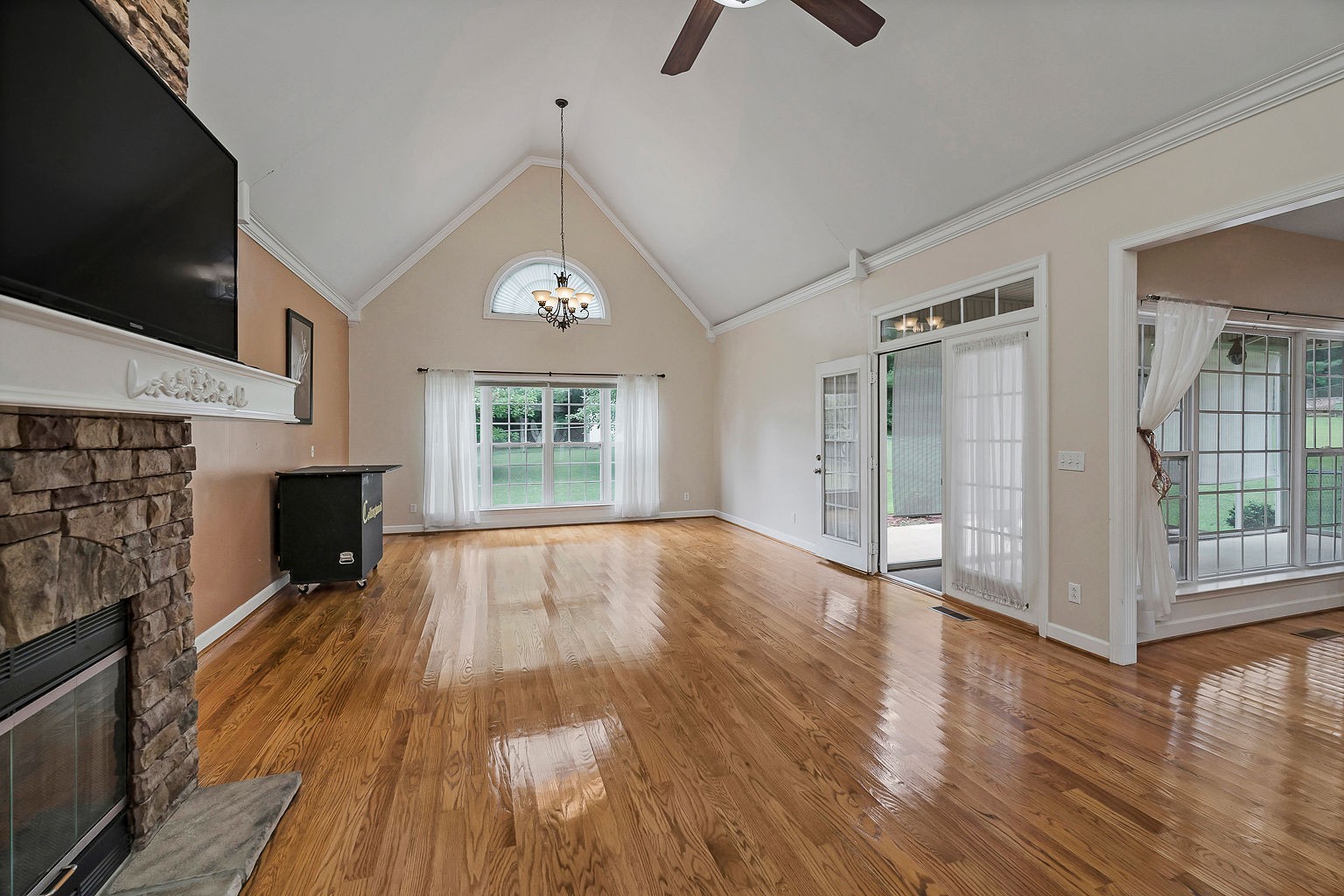 164 Simons Boulevard Morrison, TN 37357 - Photo 8 of 16 a view of empty room with wooden floor and fireplace