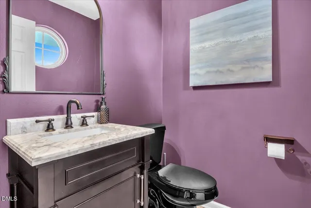 a bathroom with a sink and a toilet