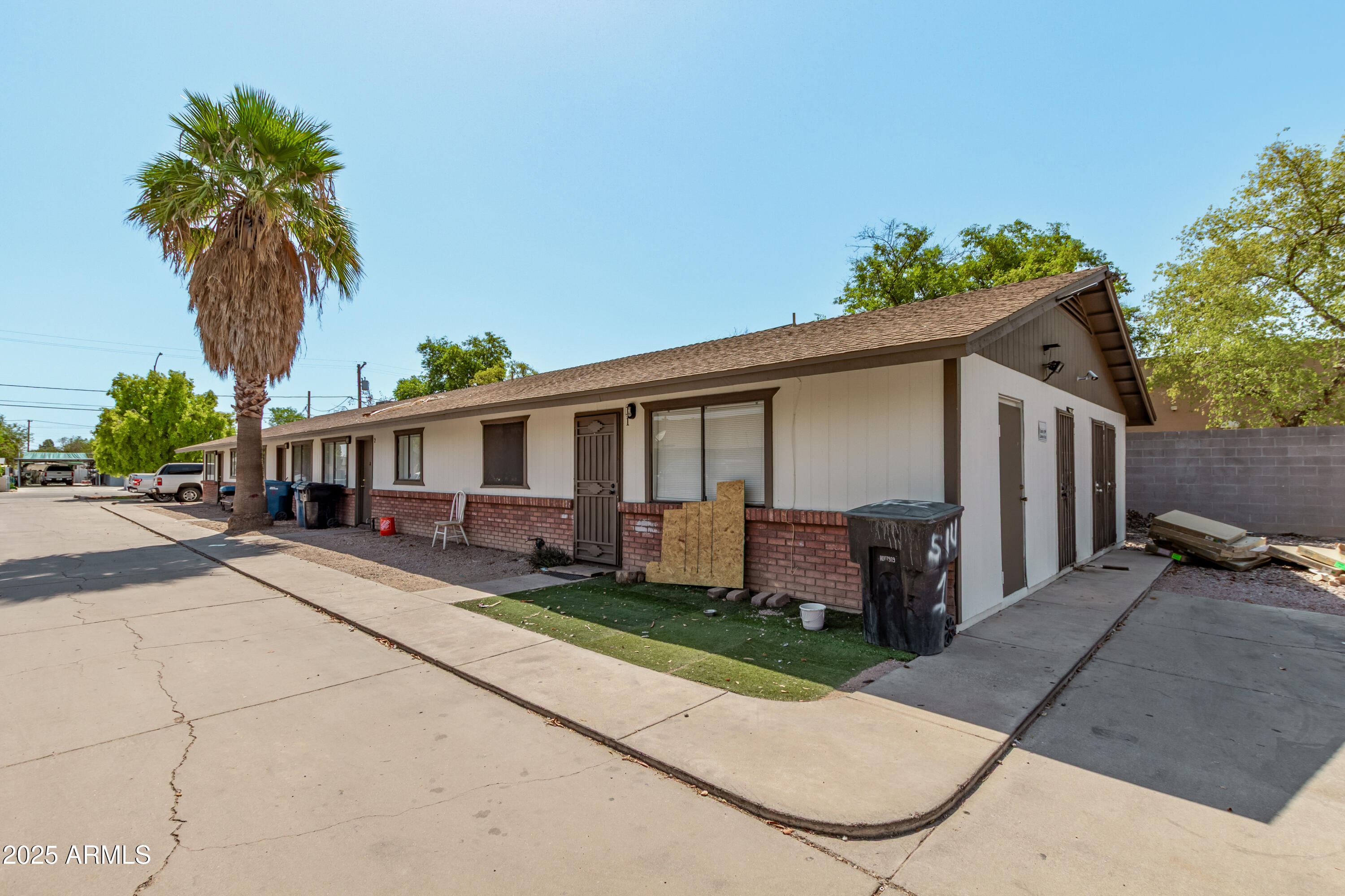 front view of a house with a patio