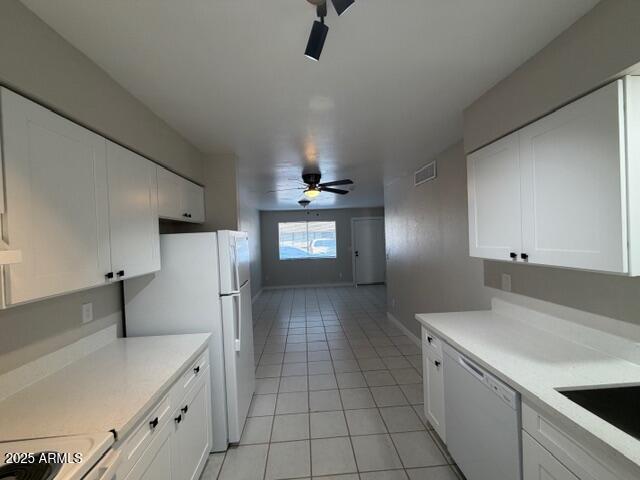 514 South Bellview, Unit 1 Mesa, AZ 85204 - Photo 2 of 21 a view of a kitchen with a sink and dishwasher refrigerator stove