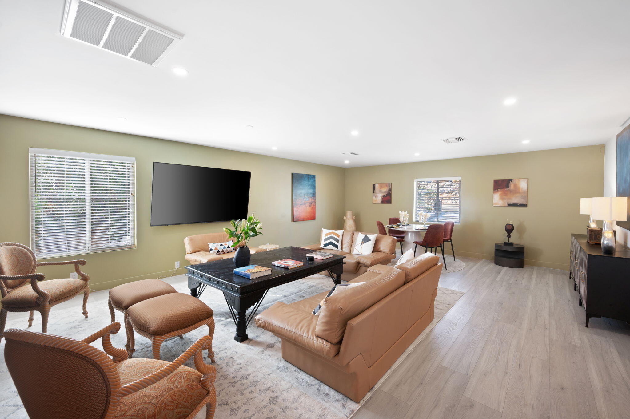 2380 North Leonard Road Palm Springs, CA 92262 - Photo 12 of 54 a living room with furniture flat screen tv and wooden floor