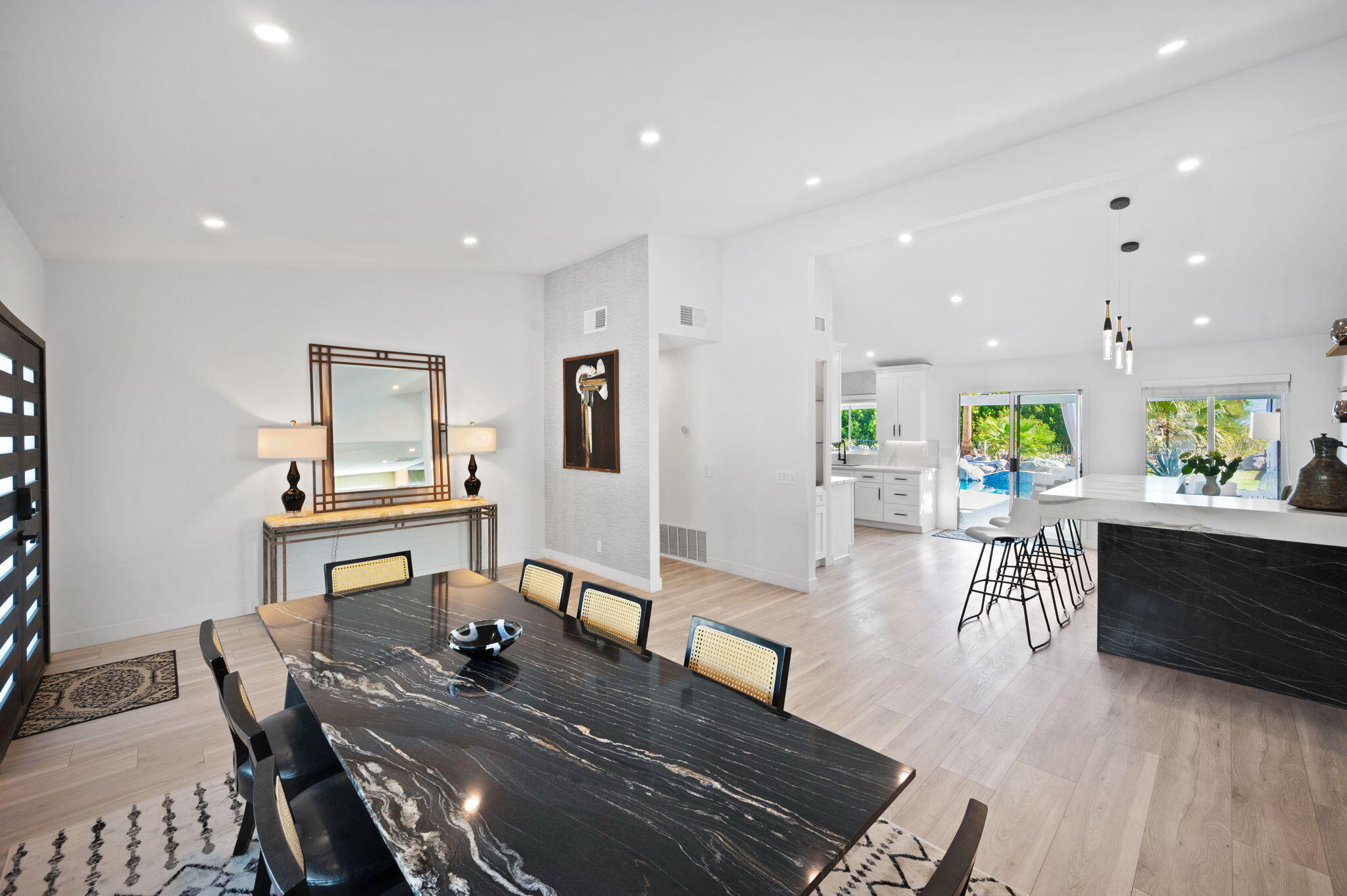 2380 North Leonard Road Palm Springs, CA 92262 - Photo 2 of 54 a living room with furniture and a wooden floor