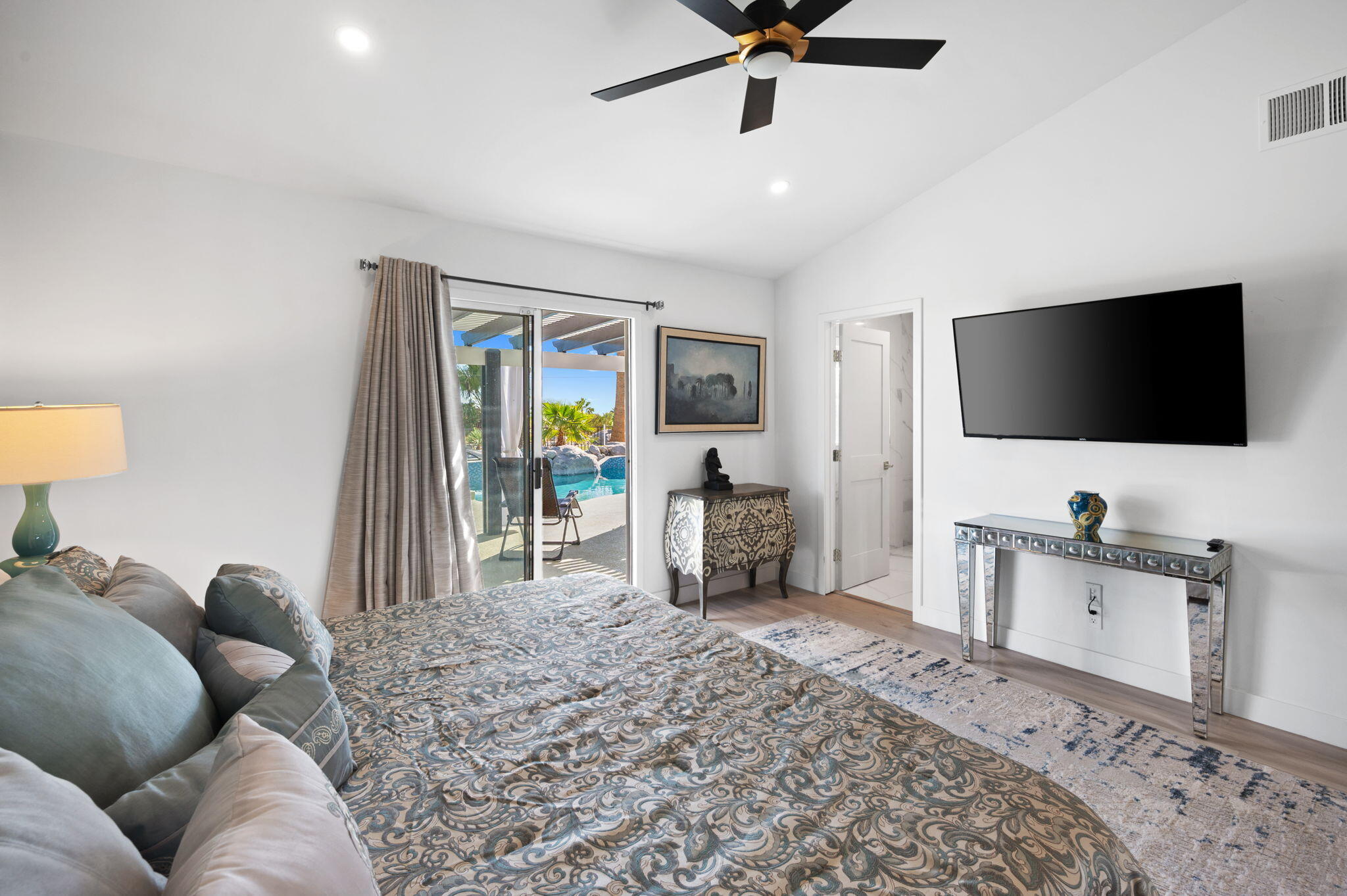 2380 North Leonard Road Palm Springs, CA 92262 - Photo 30 of 54 a living room with furniture and a flat screen tv