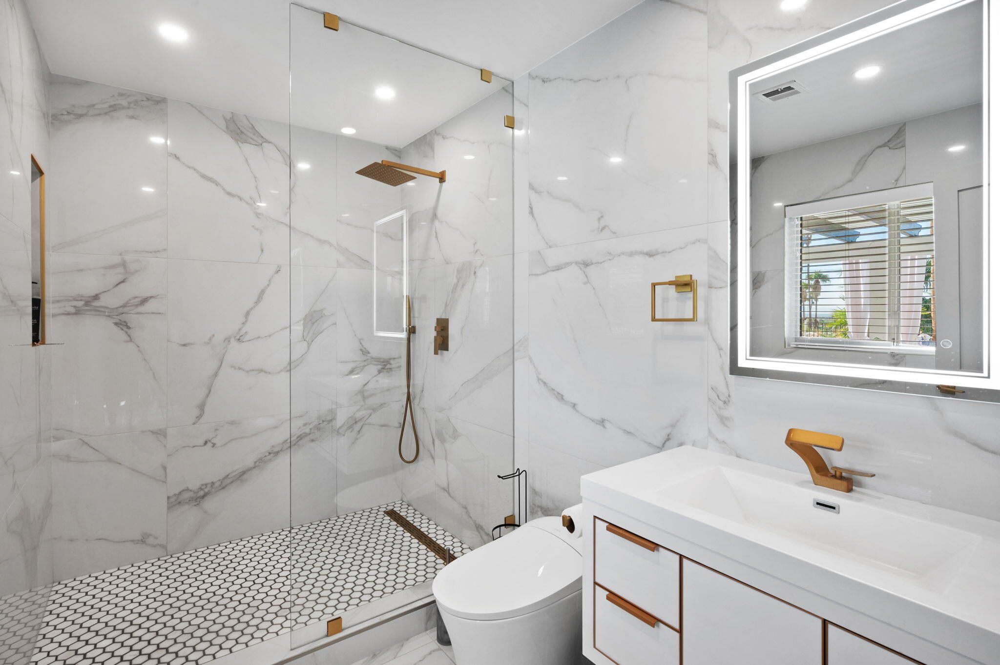 2380 North Leonard Road Palm Springs, CA 92262 - Photo 31 of 54 a bathroom with a sink toilet and shower