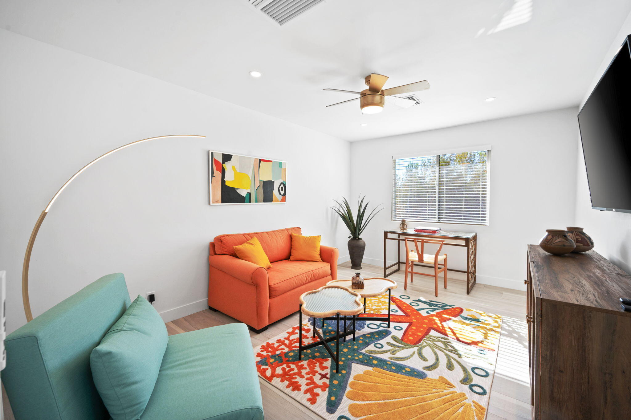 2380 North Leonard Road Palm Springs, CA 92262 - Photo 32 of 54 a living room with furniture and a flat screen tv