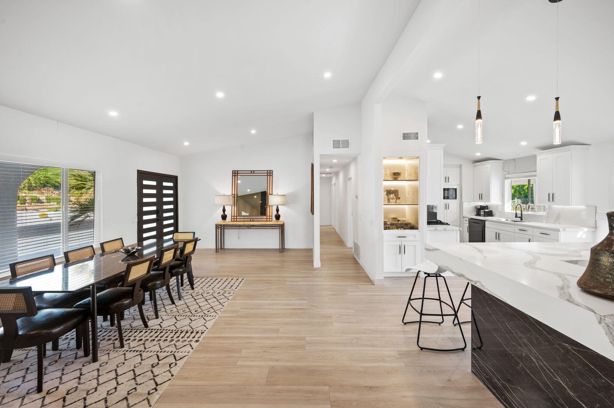 2380 North Leonard Road Palm Springs, CA 92262 - Photo 4 of 54 a view of a kitchen and dining room
