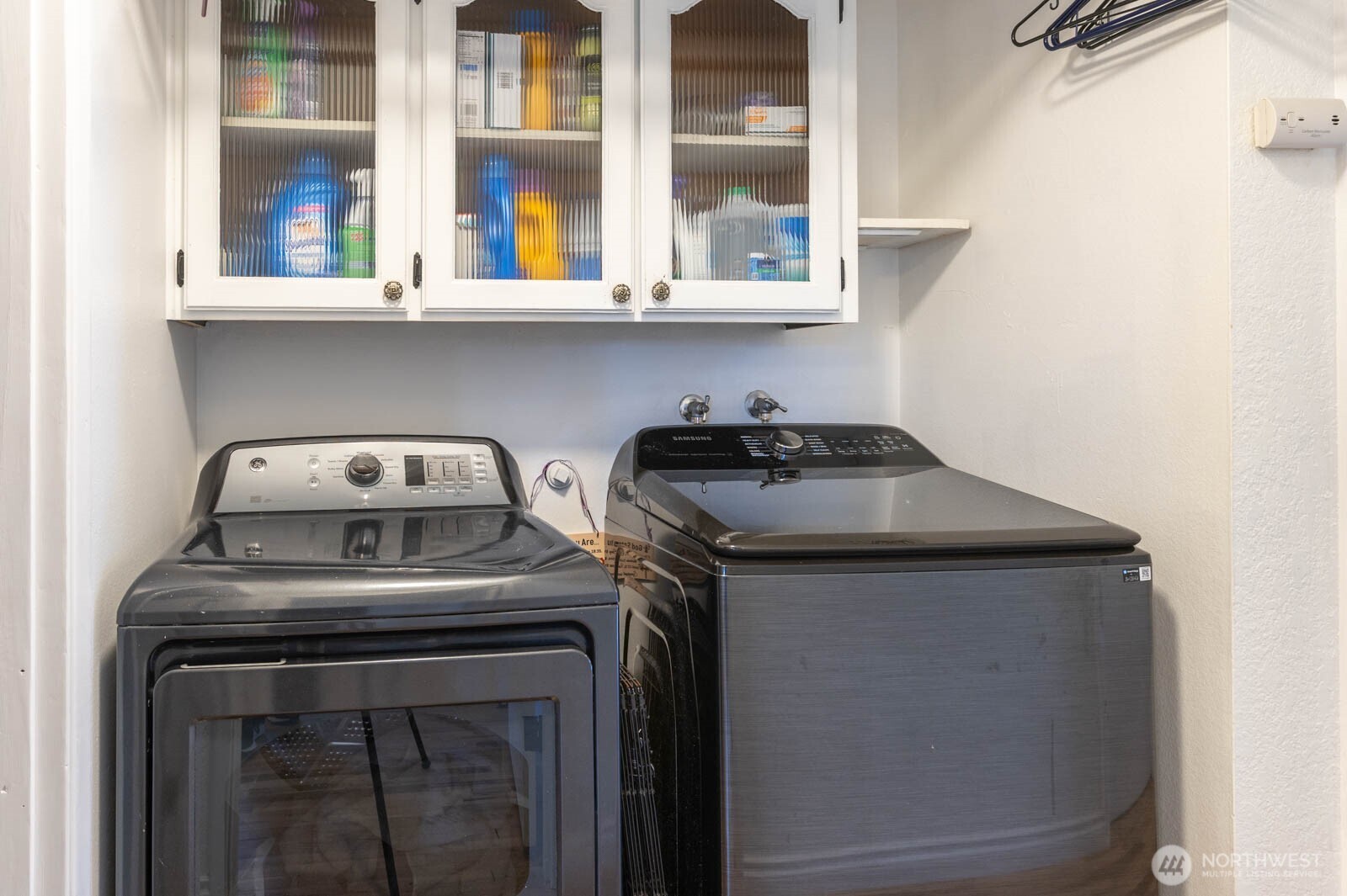 6028 South Prospect Street Tacoma, WA 98409 - Photo 17 of 32 a close up of a stove top oven sitting inside of a kitchen