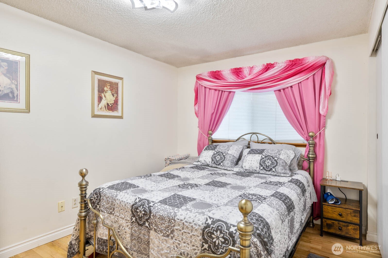 6028 South Prospect Street Tacoma, WA 98409 - Photo 19 of 32 a bedroom with a bed and a mirror