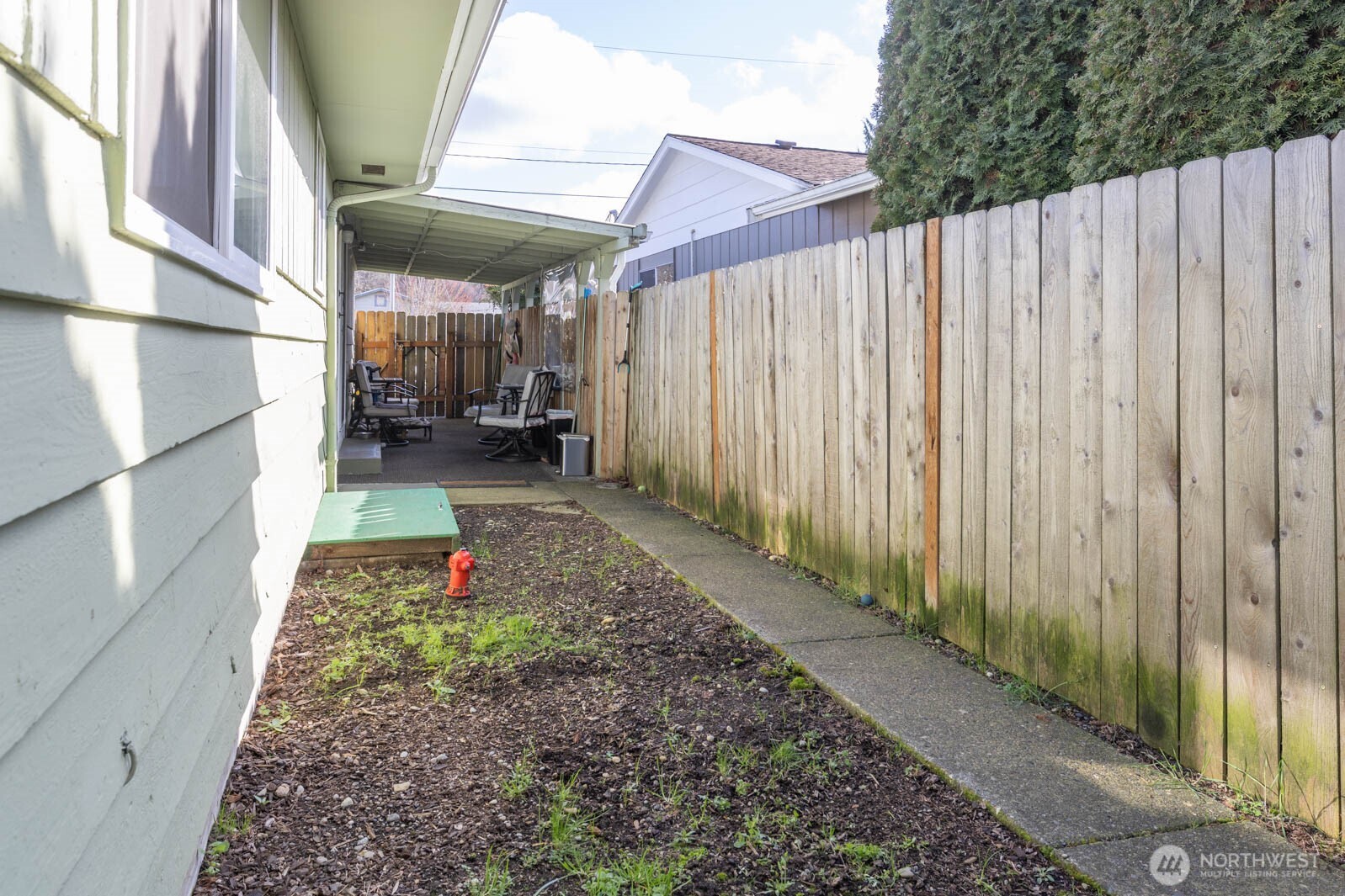 6028 South Prospect Street Tacoma, WA 98409 - Photo 26 of 32 a view of a backyard with pathway