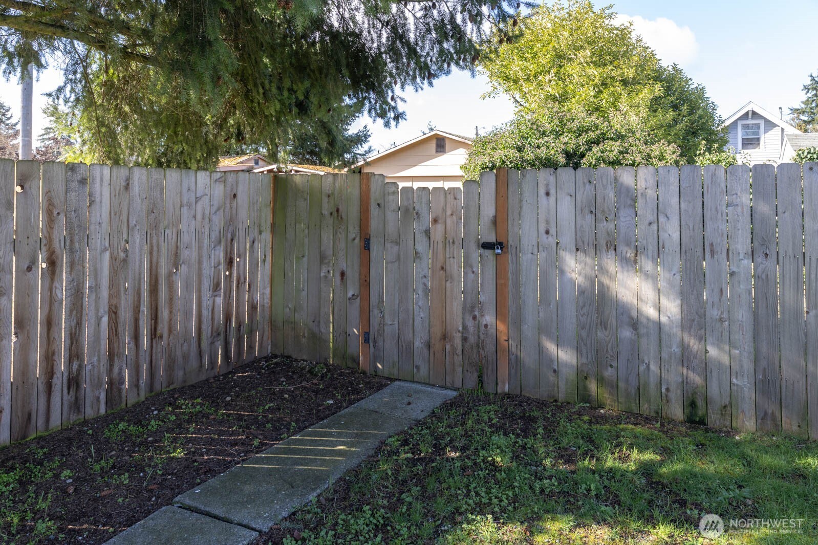 6028 South Prospect Street Tacoma, WA 98409 - Photo 27 of 32 a view of backyard with wooden fences