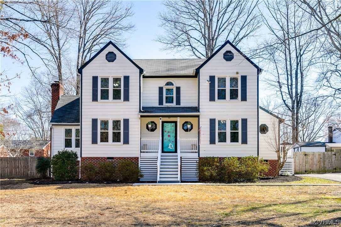 10811 Crofton Road Chester, VA 23831 - Photo 1 of 50 a front view of a house with a yard