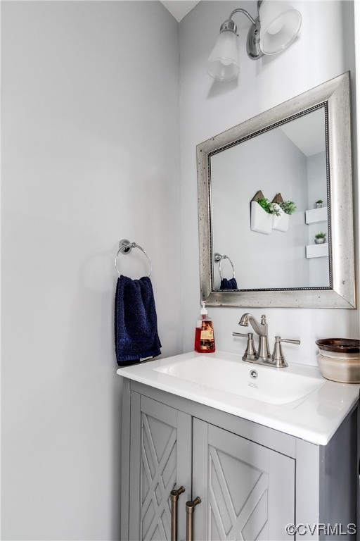 10811 Crofton Road Chester, VA 23831 - Photo 11 of 50 a bathroom with a sink and a mirror