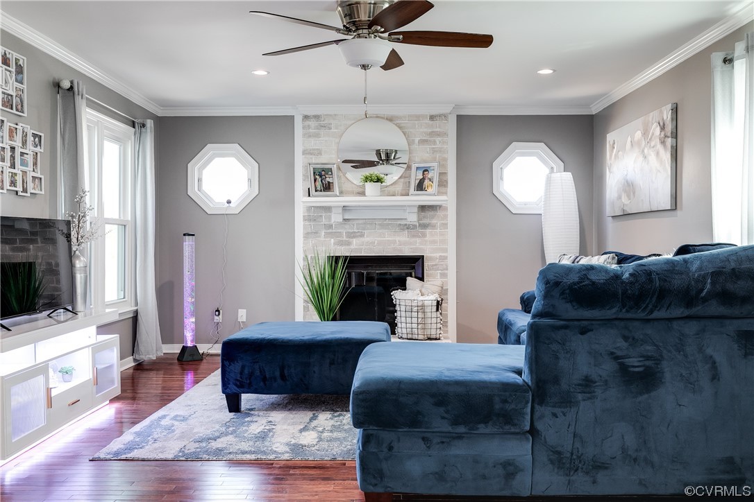 10811 Crofton Road Chester, VA 23831 - Photo 16 of 50 a living room with furniture and a fireplace