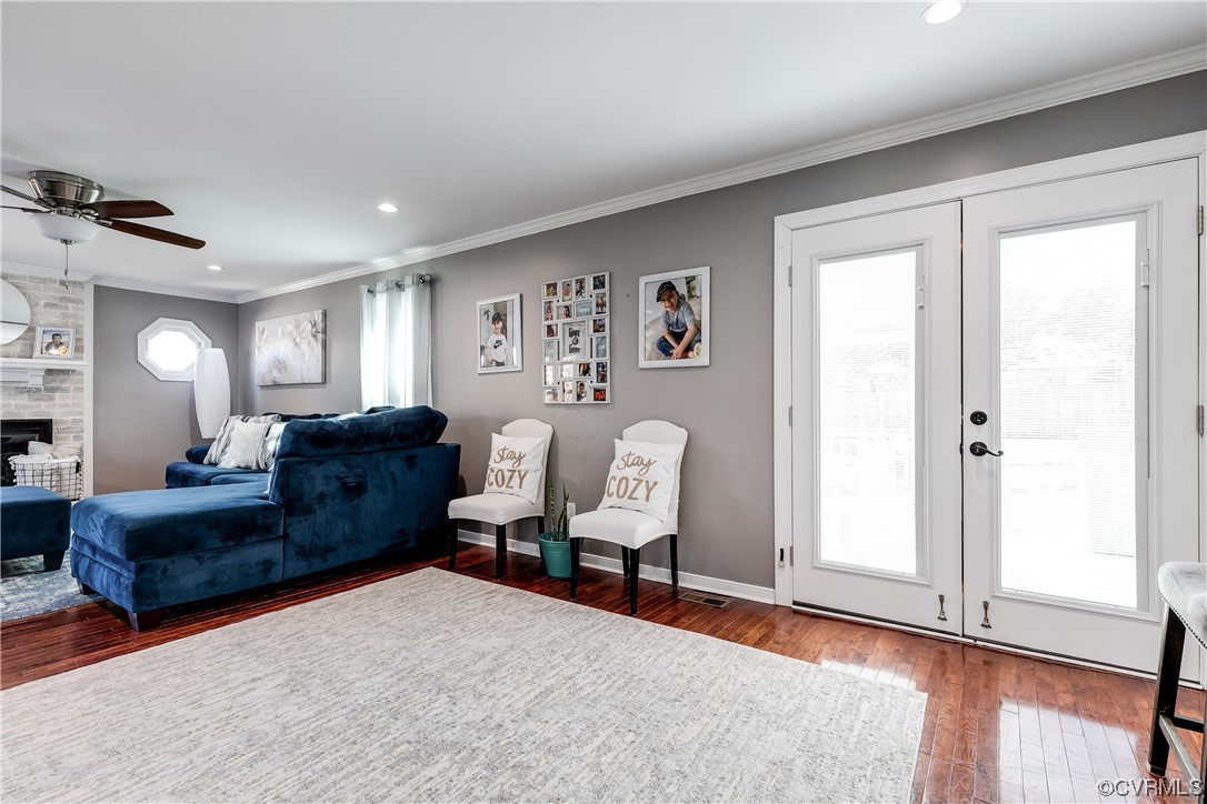 10811 Crofton Road Chester, VA 23831 - Photo 17 of 50 a living room with furniture and wooden floor