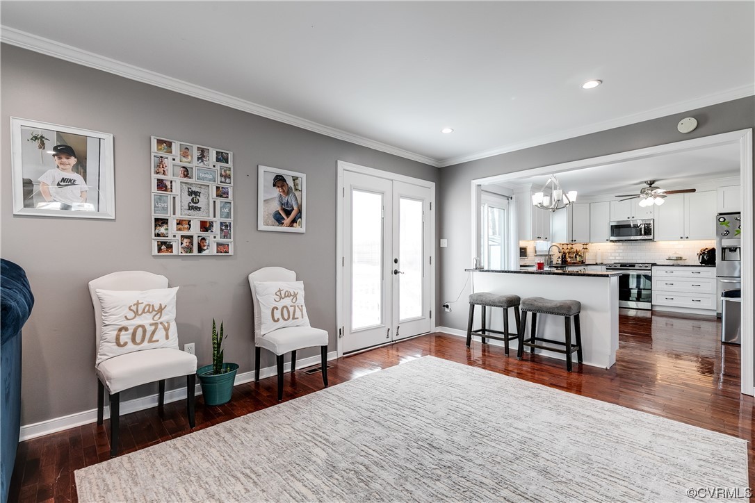 10811 Crofton Road Chester, VA 23831 - Photo 21 of 50 a living room with furniture and a wooden floor