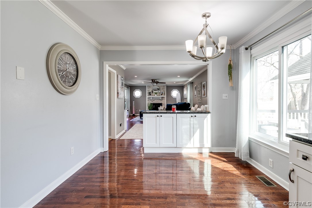 10811 Crofton Road Chester, VA 23831 - Photo 26 of 50 a view of a hallway with wooden floor