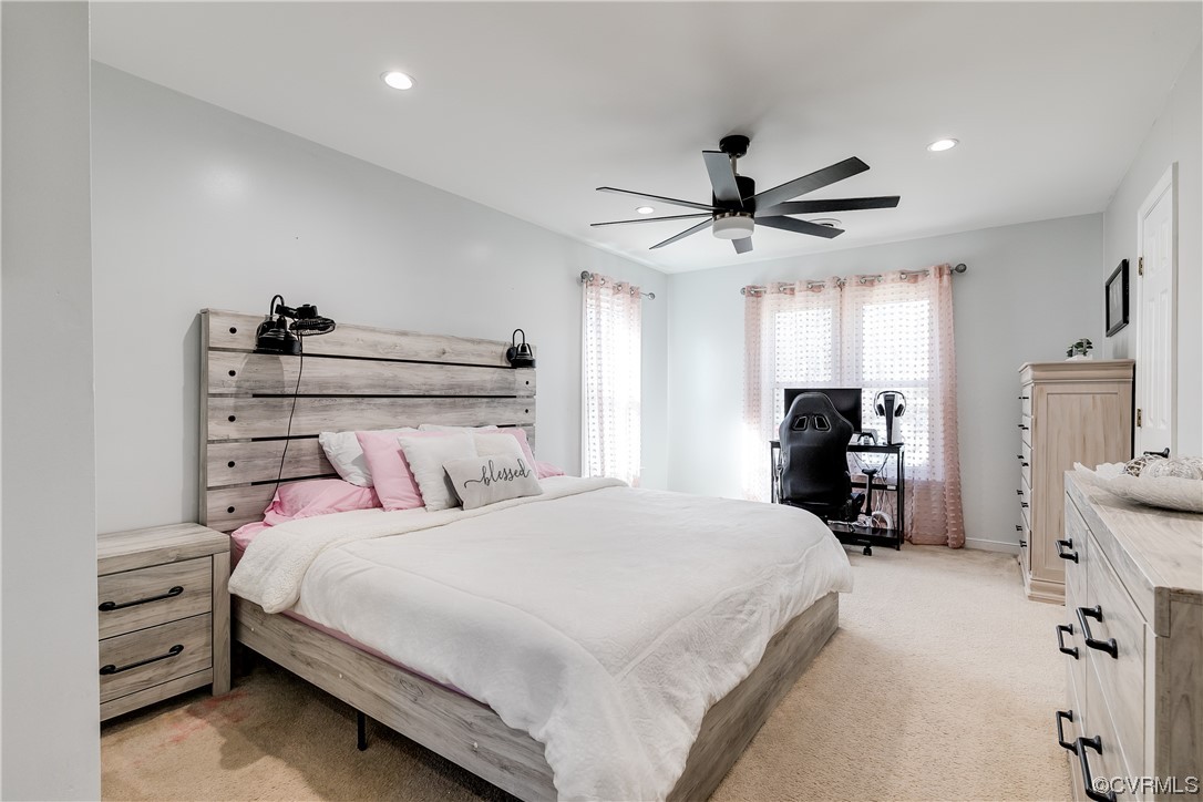 10811 Crofton Road Chester, VA 23831 - Photo 32 of 50 a bedroom with a bed and a chandelier