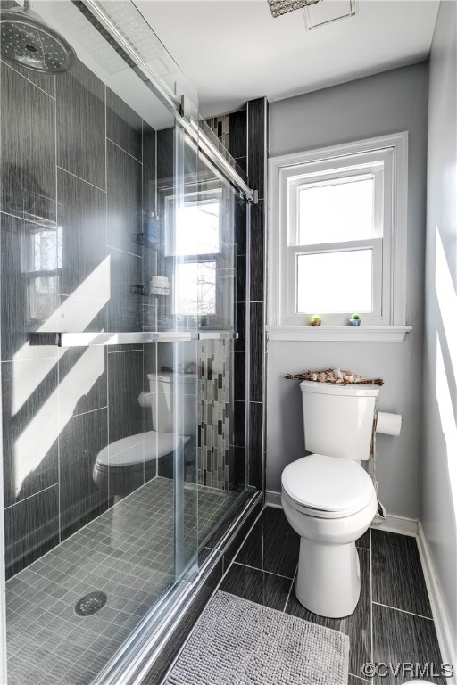 10811 Crofton Road Chester, VA 23831 - Photo 35 of 50 a bathroom with a toilet and a shower