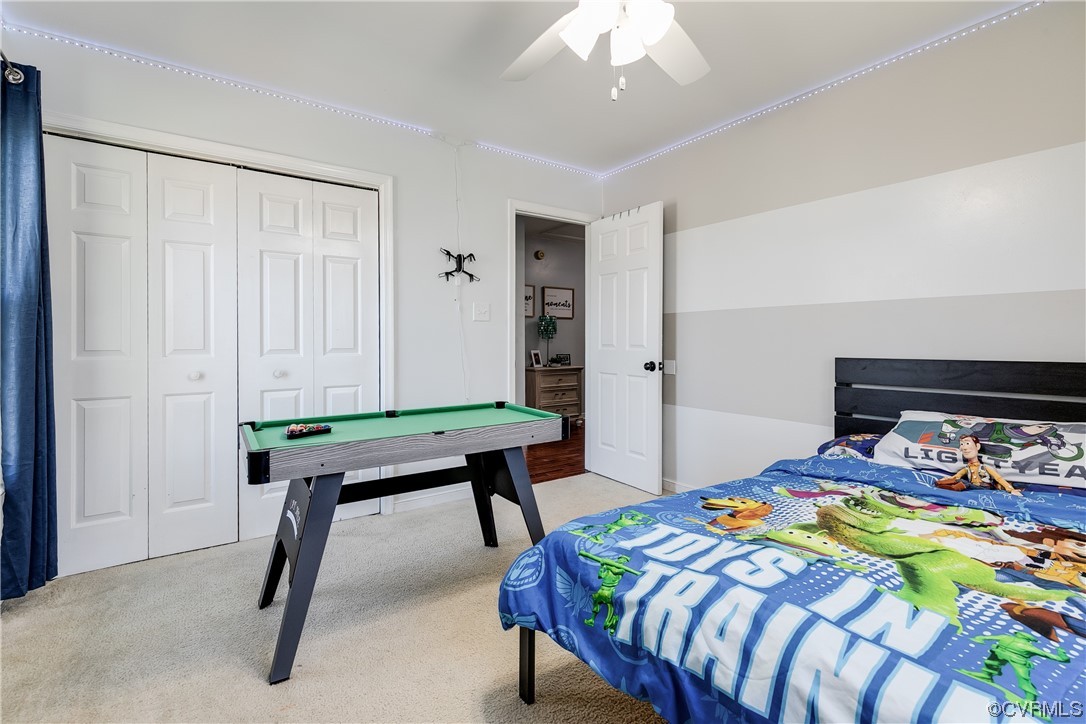 10811 Crofton Road Chester, VA 23831 - Photo 40 of 50 a bedroom that has a bed and a table in it