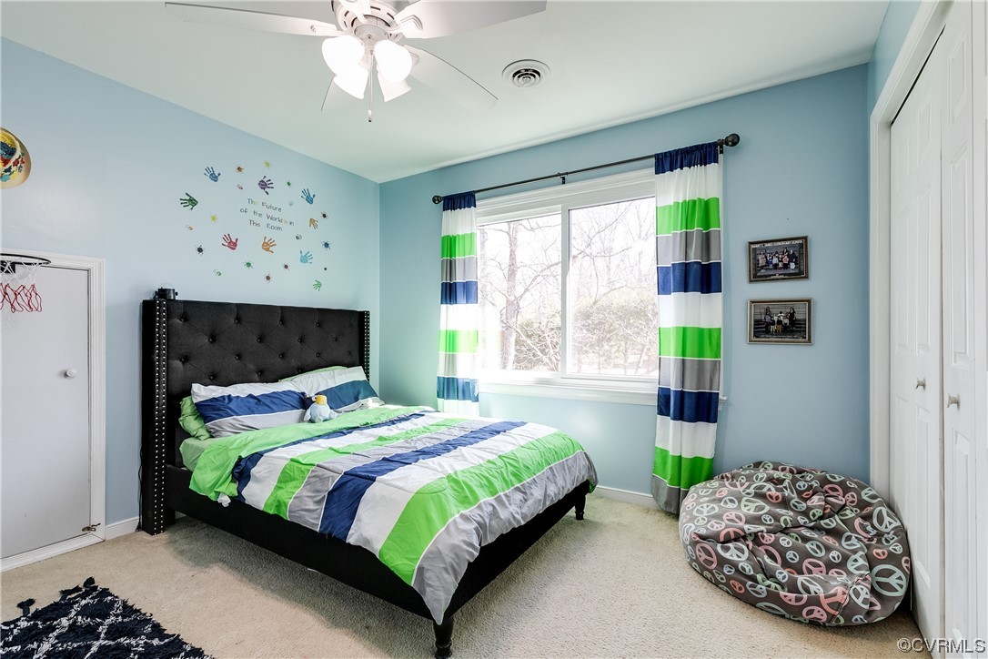 10811 Crofton Road Chester, VA 23831 - Photo 41 of 50 a bedroom with bed and window