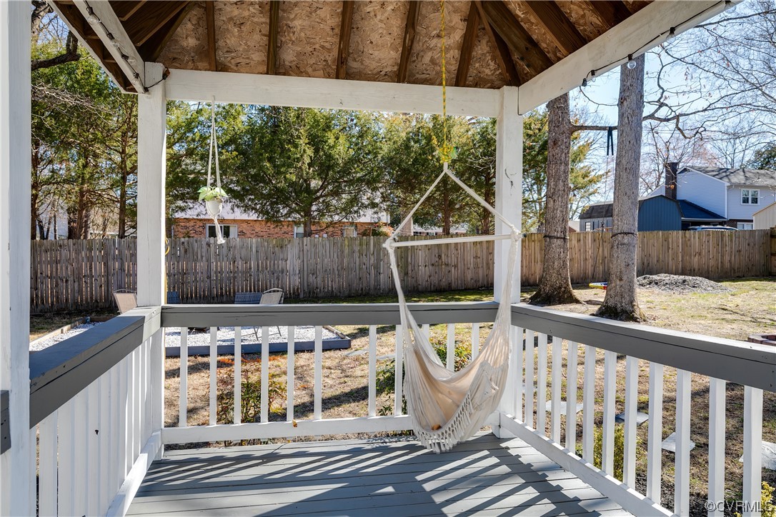 10811 Crofton Road Chester, VA 23831 - Photo 46 of 50 a view of a two chairs in the balcony
