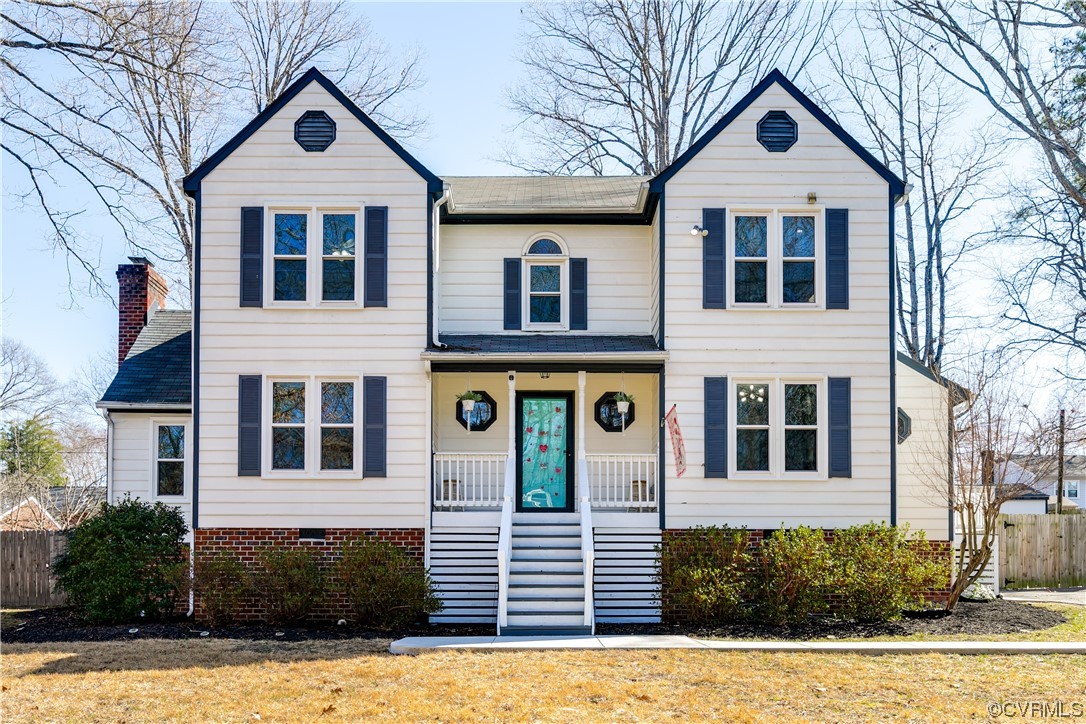 10811 Crofton Road Chester, VA 23831 - Photo 5 of 50 a front view of a house with a yard