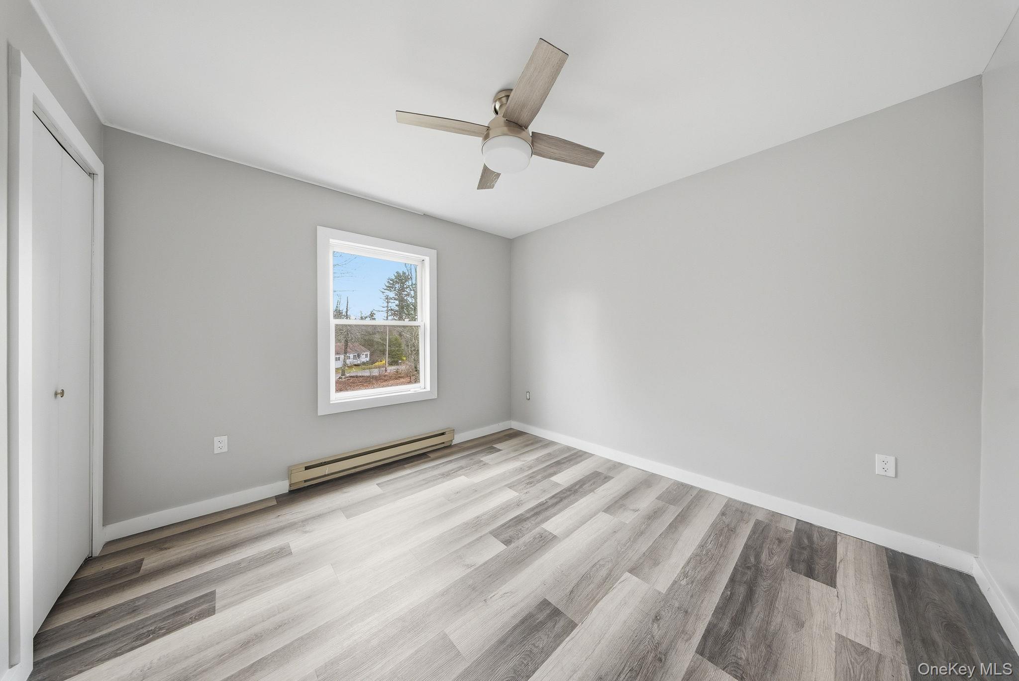 39 Dingle Daisy Road Monticello, NY 12701 - Photo 17 of 36 a view of an empty room with a window